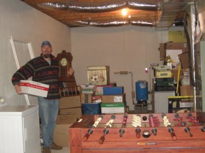 Mark standing with some of his "stuff."